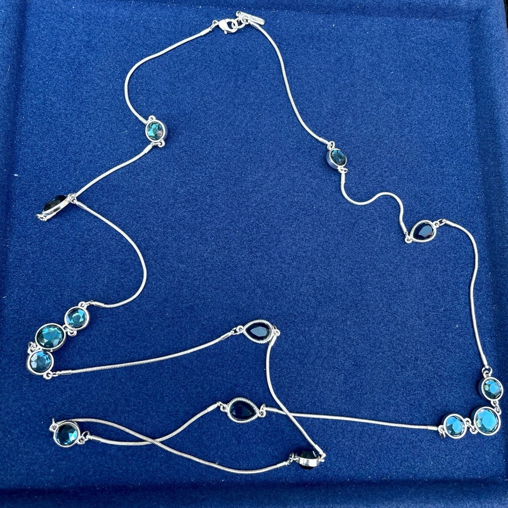 Nine West- Long blue faceted rhinestone silver tone necklace